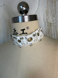 Lace choker with metal accessories