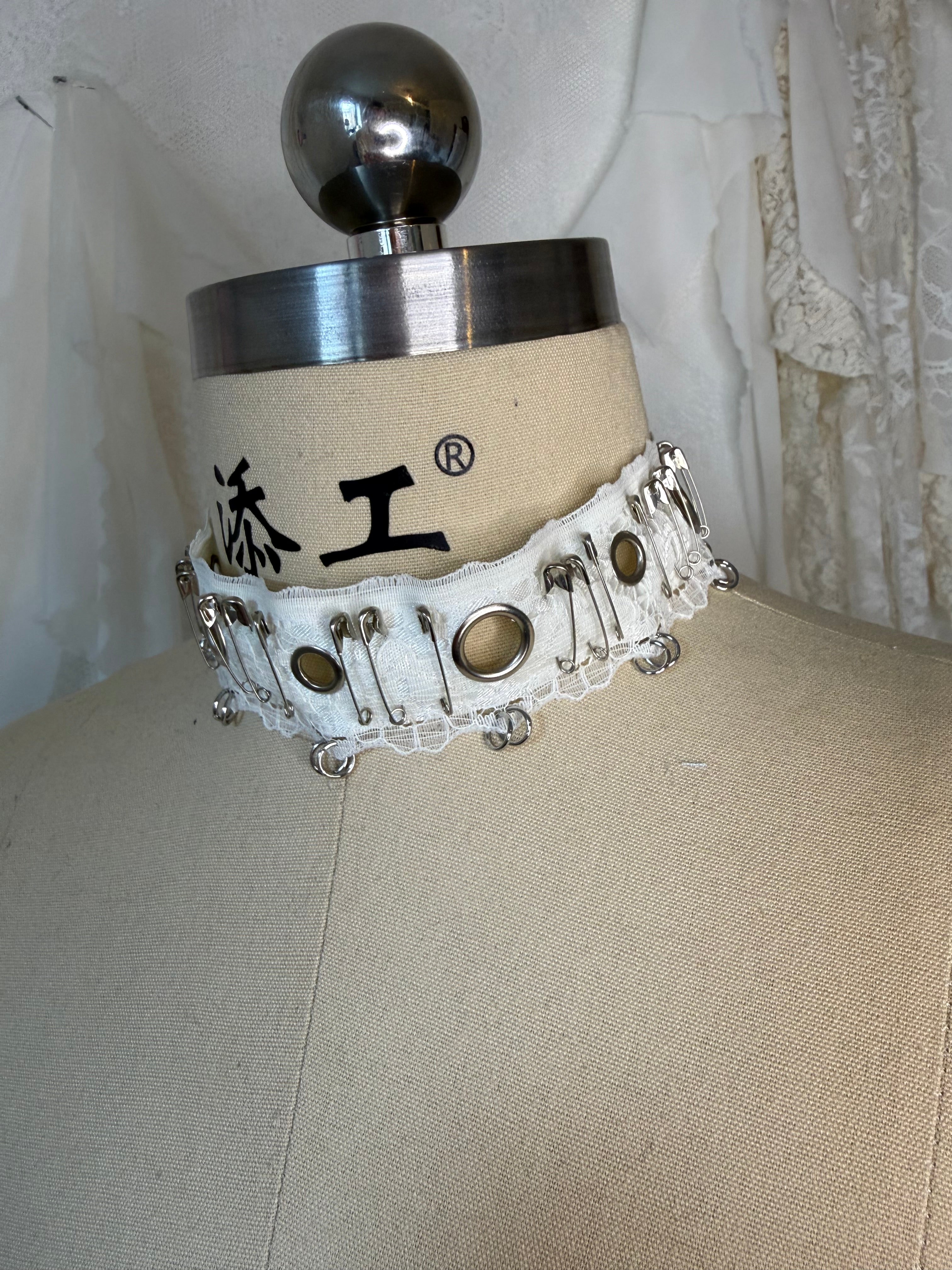 Lace choker with metal accessories